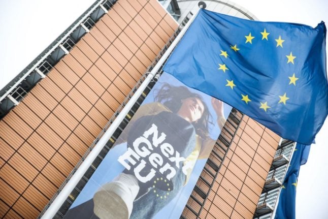 A banner publicising the 'Next Generation EU' campaign and with an EU flag