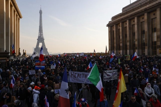 Protesters gather to demonstrate in Paris against the new vaccine pass.