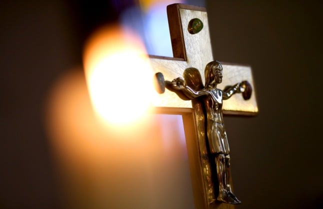 Archive photo shows a cross in a Catholic church in Magdeburg, Saxony-Anhalt.