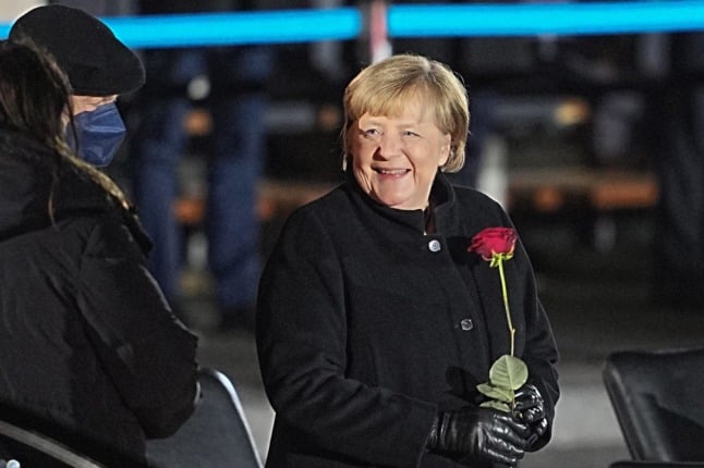 Angela Merkel  stands next to her husband, Joachim Sauer, after her special farewell by the Bundeswehr on December 2nd 2021. 