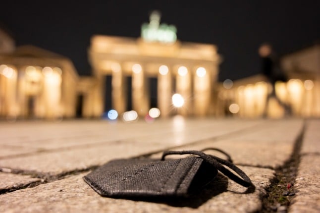 A face mask on the ground near Brandenburg Gate in Berlin.