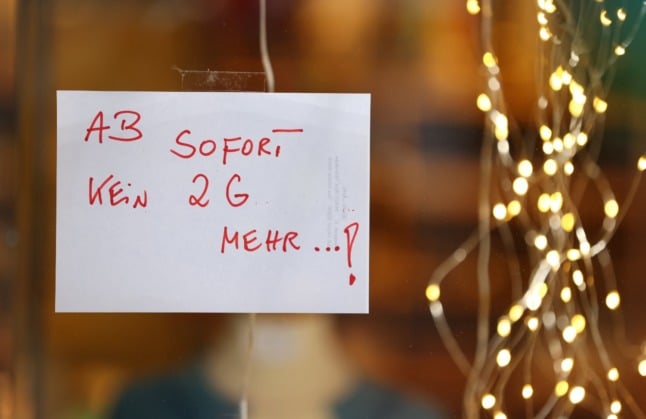 A sign on a shop in Bad Wörishofen, Bavaria, says: 'No more 2G with immediate effect' following a court decision.