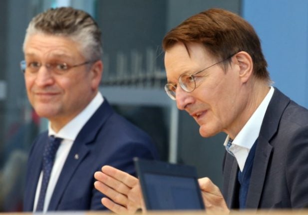 Health Minister Karl Lauterbach talks at a press conference alongside RKI head Lothar Wieler.