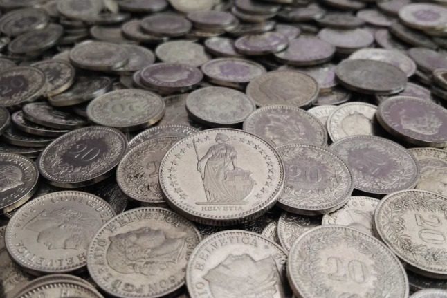 Swiss franc coins in a pile