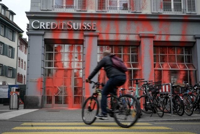 A Credit Suisse branch targeted in a paint attack in 2020. The organisation has come under increasing fire in recent weeks. Photo: Fabrice COFFRINI / AFP