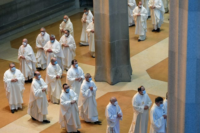 Priests at the Sagrada Familia in Barcelona