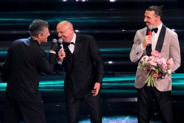 Italian singer and showman Rosario Tindaro Fiorello, aka Fiorello, Bologna's Serbian coach, Sinisa Mihajlovic, and AC Milan's Swedish forward Zlatan Ibrahimovic perform during the San Remo 2021 music festival.