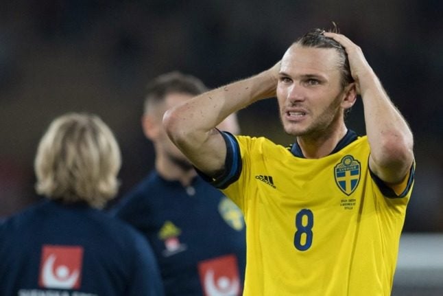 Sweden's midfielder Albin Ekdal reacts during football match