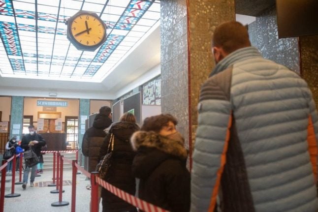 People queue for a vaccine against Covid in Vienna. The Austrian capital is taking steps to make it easier for those with a phobia of needles to get the jab. ALEX HALADA / AFP