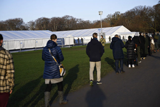 People wait for Covid-19 testing in Denmark in December.