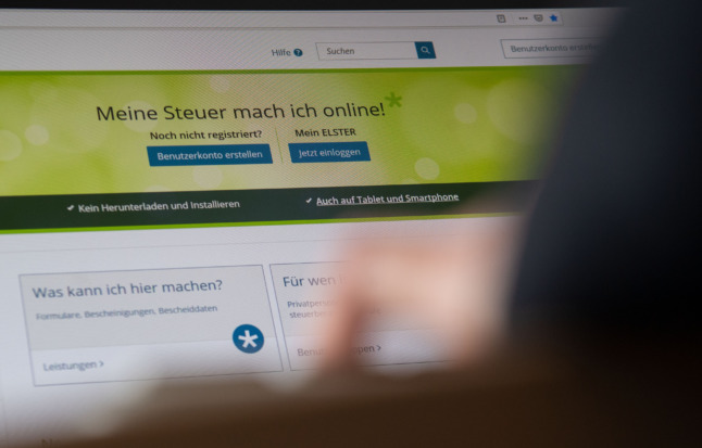 A woman fills out her tax declaration on ELSTER