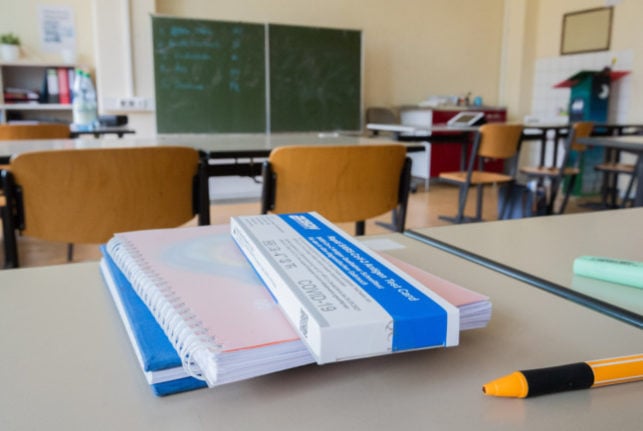 A Covid self-testing kit lies on a desk at a school in Hildesheim