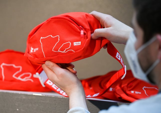 A Berlinale employee sorts through the festival's bum bags.