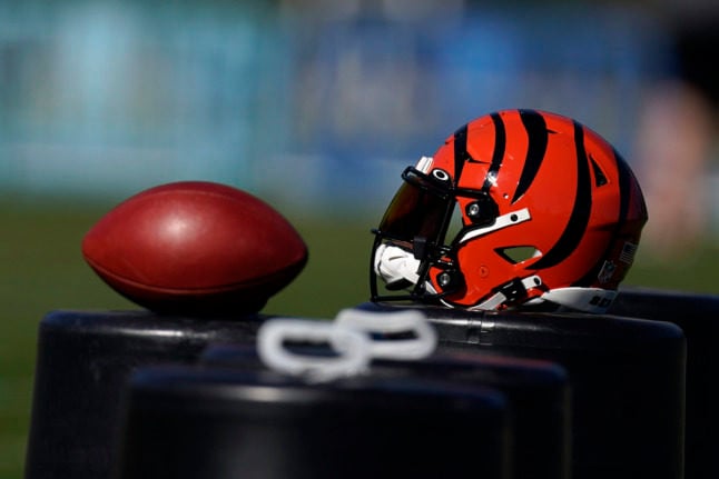 A Cincinnati Bengals helmet lies on the sidelines during a practice. The Cincinnati Bengals will play the Los Angeles Rams in the Super Bowl on February 13th.