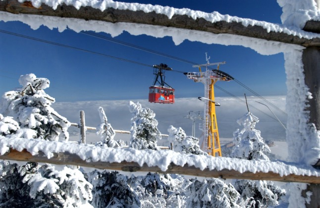 The ski lift rises up from Oberwiesenthal towards the peak of Fichtelberg