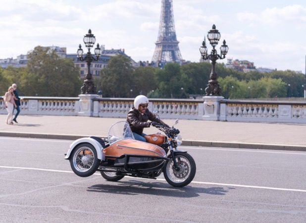 Simon Burke tests out a Txango Tour sidecar in Paris.