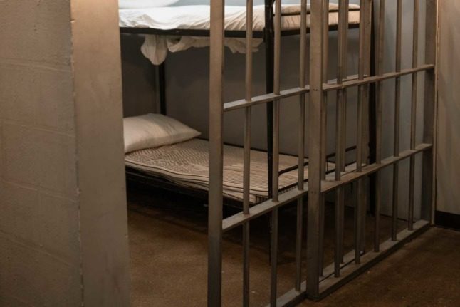 Bunk beds are seen in a prison cell. Photo by RODNAE Productions from Pexels