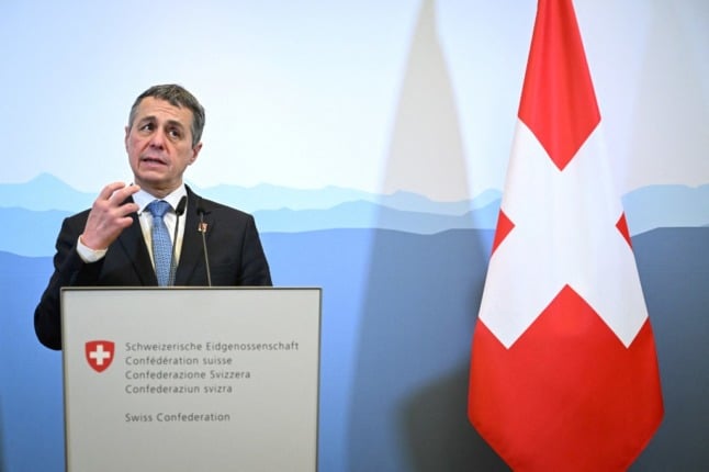 President Ignazio Cassis said Switzerland will join the EU in imposing sanctions on Russia. Photo by Fabrice COFFRINI / AFP)
