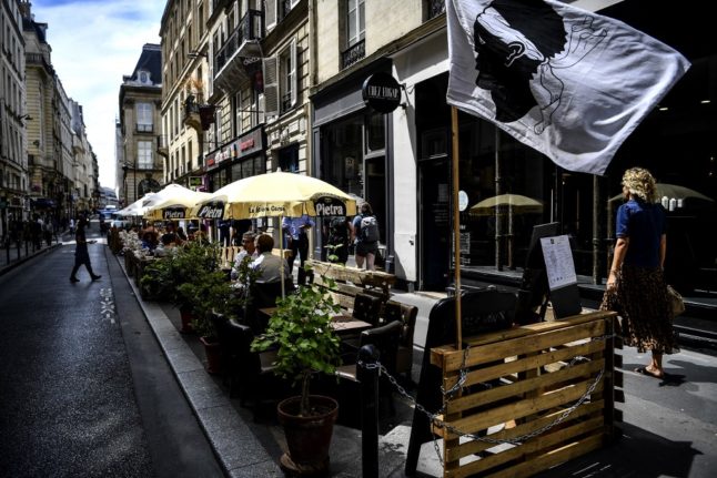 Extended terraces, demarcated with wooden pallets, have become a common summer fixture in Paris