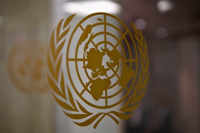 The United Nations logo, seen up close. Photo: ANGELA WEISS / AFP