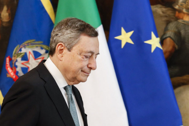 Italian Prime Minister Mario Draghi leaves after a speech on the Ukraine situation in Rome's Palazzo Chigi on February 24, 2022, after Russia's ground forces invaded Ukraine.