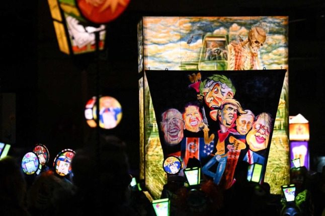 Tens of thousands returned to the Basel Carnival after two years of cancellations due to the Covid pandemic. Photo: SEBASTIEN BOZON / AFP