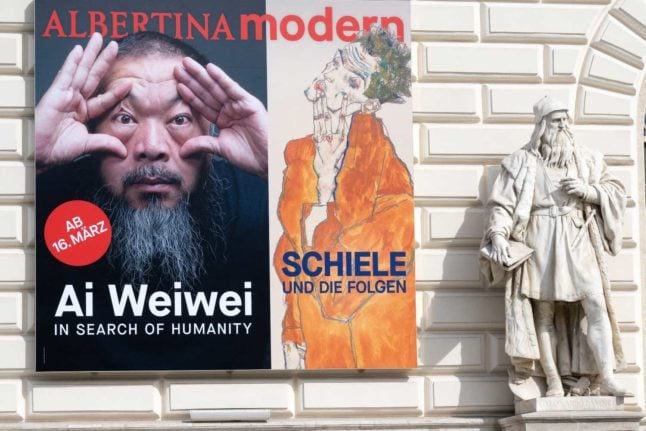 A poster outside Vienna's Albertina Modern promoting a new exhibition from Chinese artist Ai Weiwei Photo: JOE KLAMAR / AFP