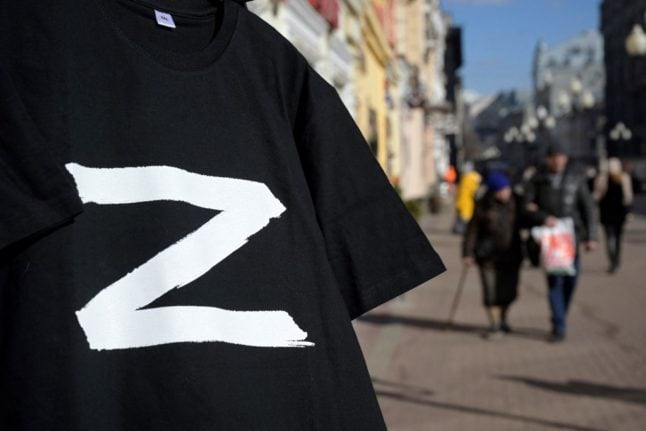 'Z' t-shirts are sold in Russian marketplaces. Two German states have banned the symbol.