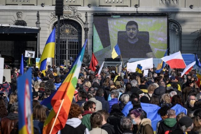 Ukraine's Zelensky blasts Swiss banks in address to Bern rally