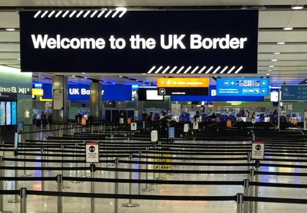 A UK border sign welcomes passengers at Heathrow airport.