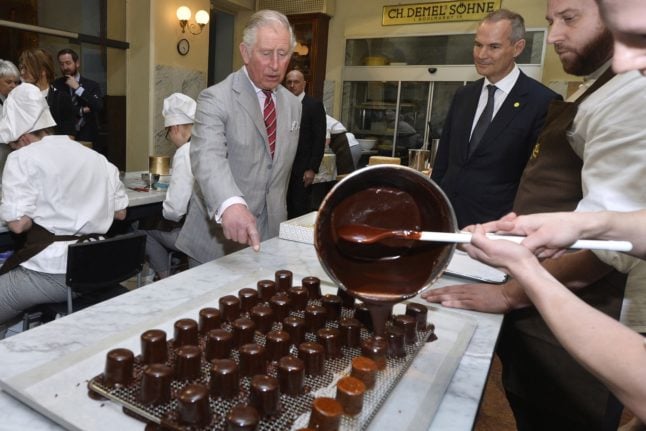 Prince Charles tours a coffee house in the Austrian city of Vienna. Austria's coffee houses are city institutions. Photo: HERBERT PFARRHOFER / APA / AFP