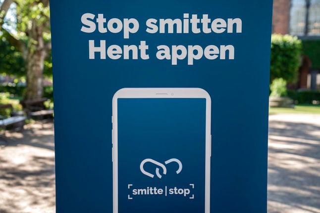 A file photo of a poster for Denmark's Covid-19 contact tracing app