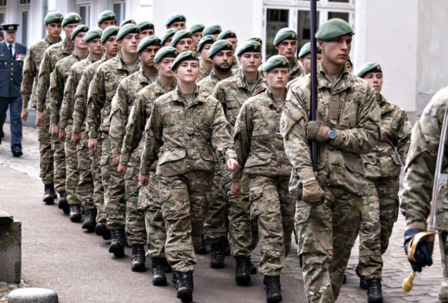 Danish soldiers parade during national Flag Day