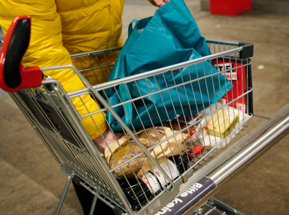 A shopper loading a trolley in Berlin in November 2021.