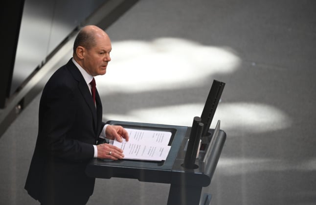 German Chancellor Olaf Scholz gives a speech in the Bundestag on Sunday.