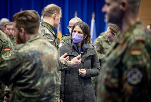 German Foreign Minister Annalena Baerbock, of the Greens, talks to Bundeswehr (army) soldiers of the German KFOR contingent in Kosovo on March 10th.