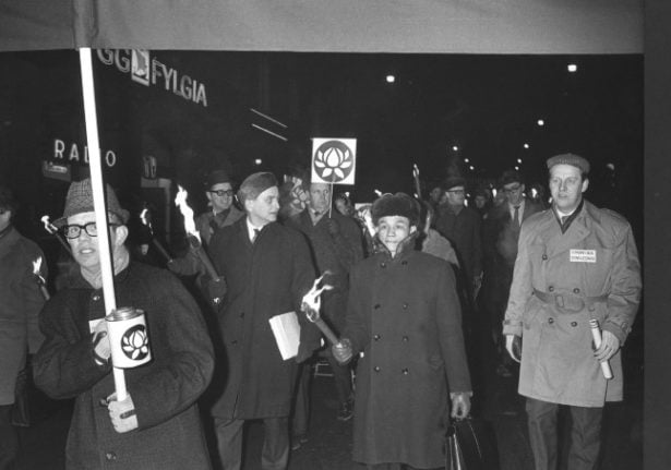 Sweden's former Prime Minister Olof Palme marching side by side with Nguyen Tho Chyan, the ambassador of North Korea to Moscow, in 1968