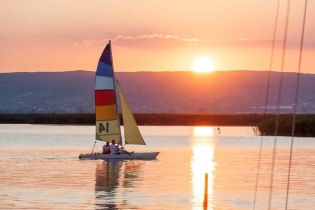 A boat seen sailing near Neusiedl am See. Photo by Dimitry Anikin on Unsplash