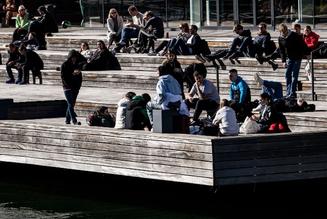 People soaking up the sun in Malmö over the weekend.