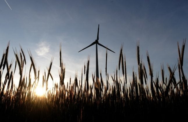 A wind turbine rises above field in Burgenland.