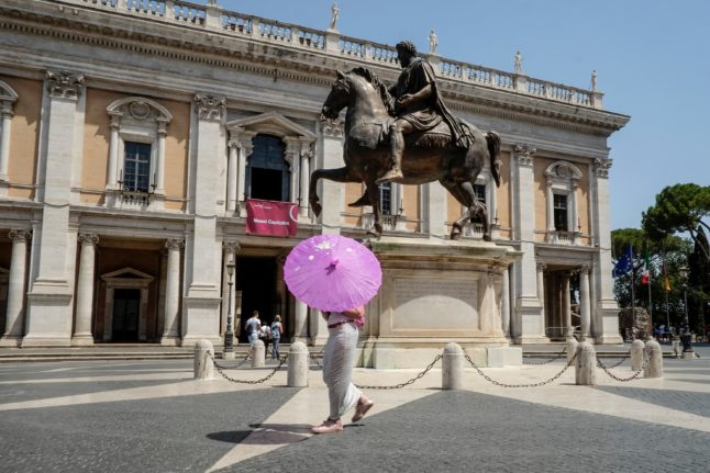 A tourist walks outside the Capitoline Museums in central Rome.
