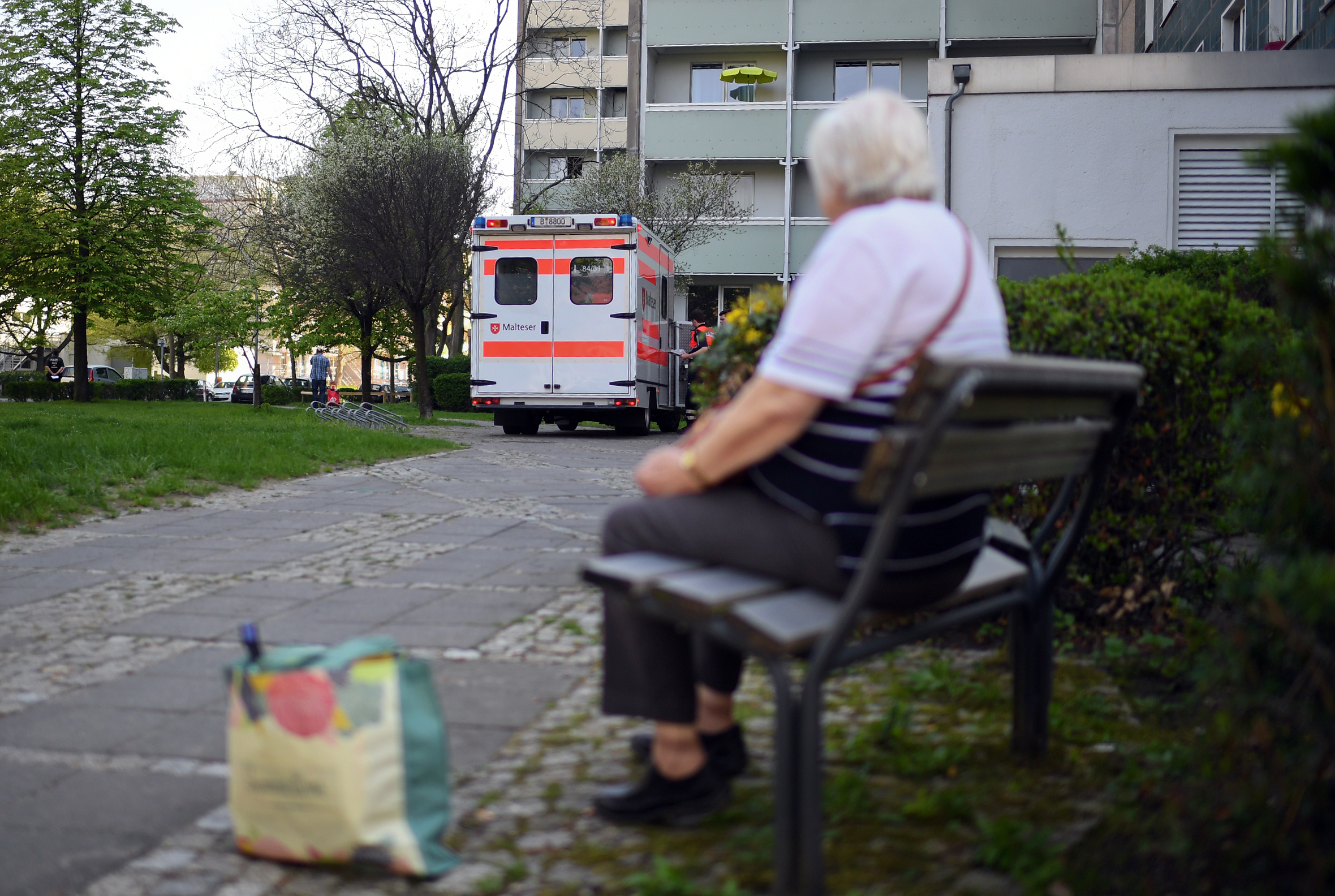 An elderly woman waits for a lift in Berlin