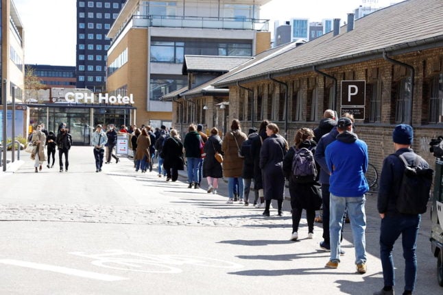 People queue for Covid-19 testing in Denmark in April 2021.