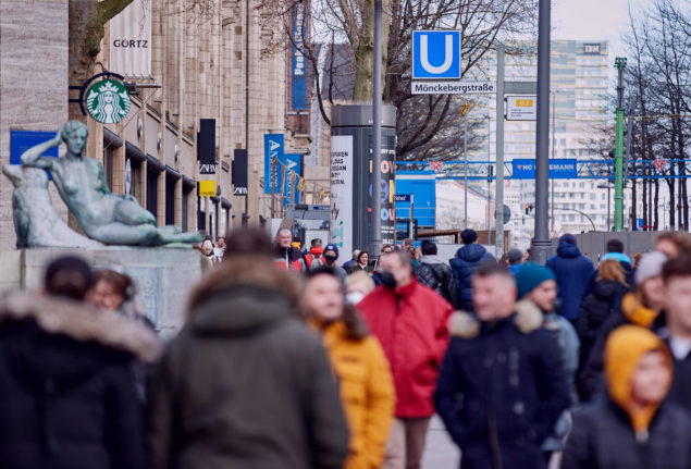 People walk in central Hamburg.