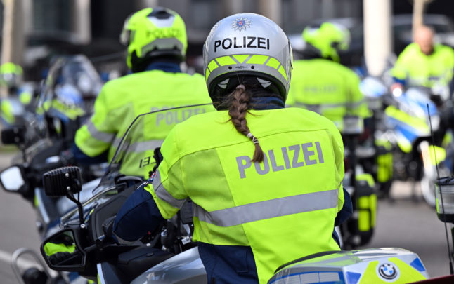 Police officers ride together on motorcycles in Erfurt, Thuringia
