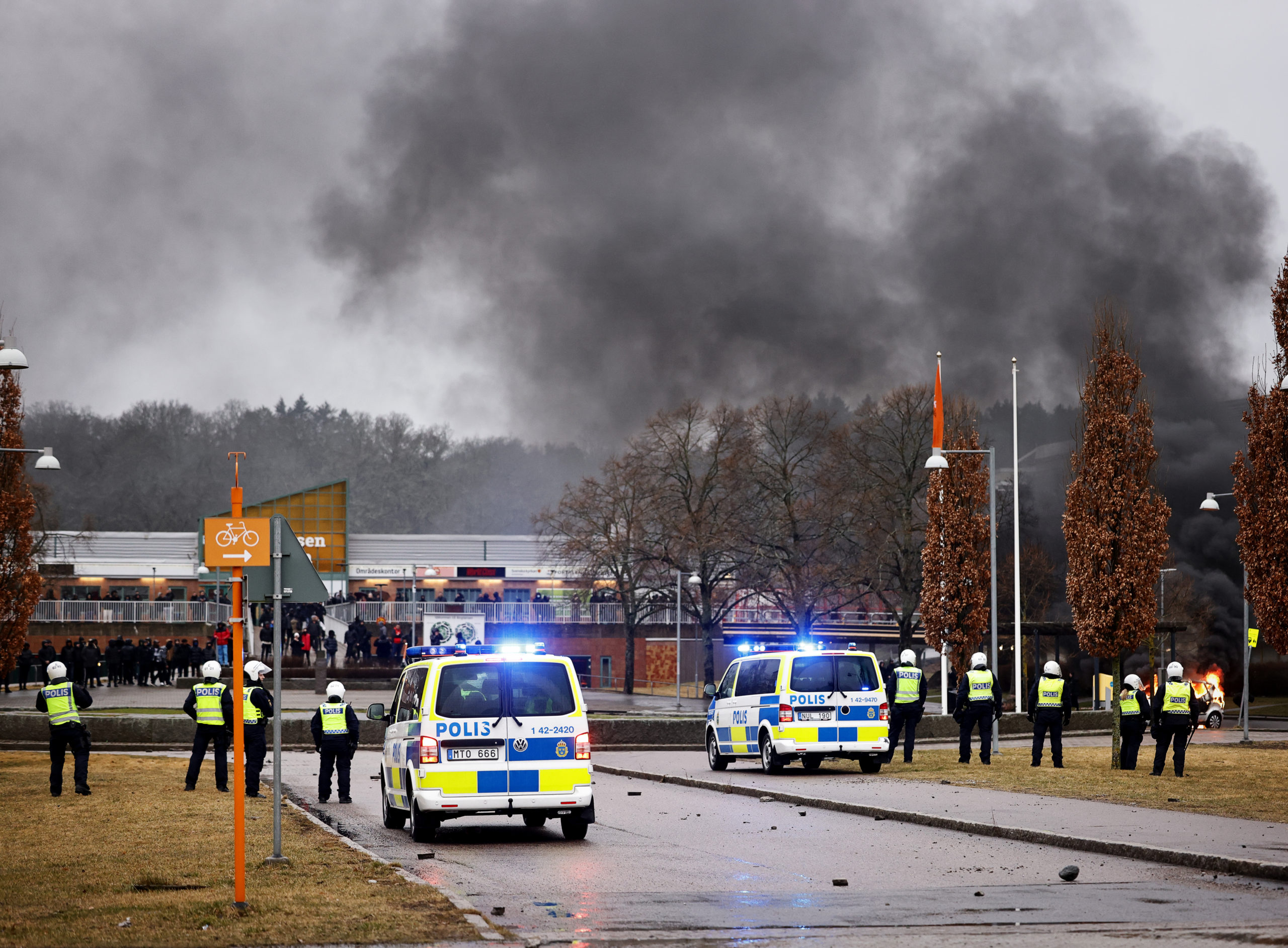 Rioters throwing stones at the police in Navesta in Norrköping on Thursday evening, 14th April 2022. 