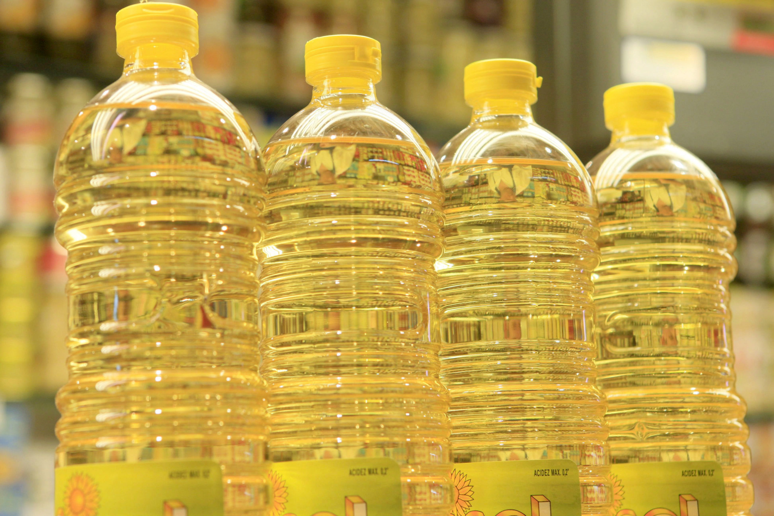 Several sunflower oil bottles in a shop in Madrid, Spain.