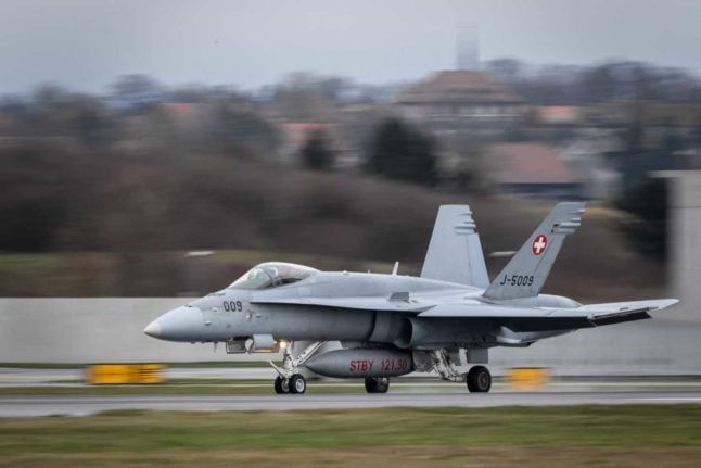 A Swiss military jet takes off from a base in the canton of Vaud, Switzerland. Photo: FABRICE COFFRINI / AFP