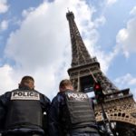 French police arrest three Eiffel Tower tourist scammers