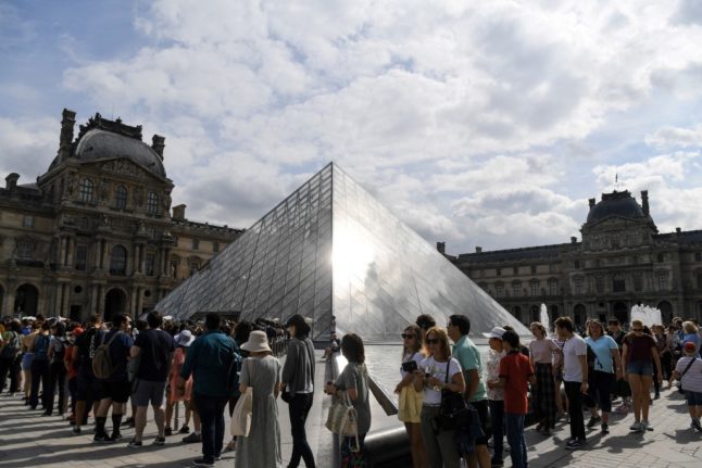 Former Louvre museum director charged in art trafficking case